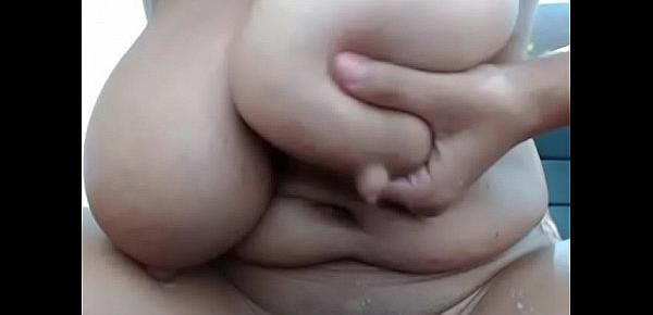  Milf grabs her huge boobs with breast milk